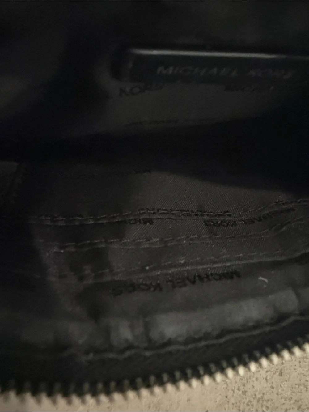 Michael Kors Black MK Signature Zip Wristlet with Silver Plate